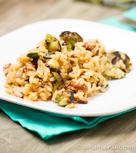 Bacon Brussels Sprouts Risotto: Easy, fail-proof, flavor rich risotto with smokey bacon and plenty of delicious brussels sprouts. This dish appears fancy, but is actual super easy, making it perfect for entertaining!