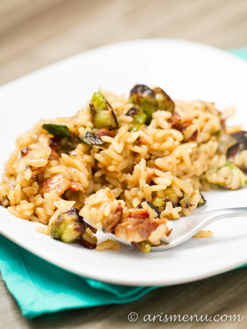 Bacon Brussels Sprouts Risotto: Easy, fail-proof, flavor rich risotto with smokey bacon and plenty of delicious brussels sprouts. This dish appears fancy, but is actual super easy, making it perfect for entertaining!