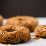 Apple Cider Donuts with Molasses Dulce Glaze: Delicious, comforting baked almond meal donuts are grain-free, naturally sweetened and contain no butter or oil, but they taste like a decadent treat!